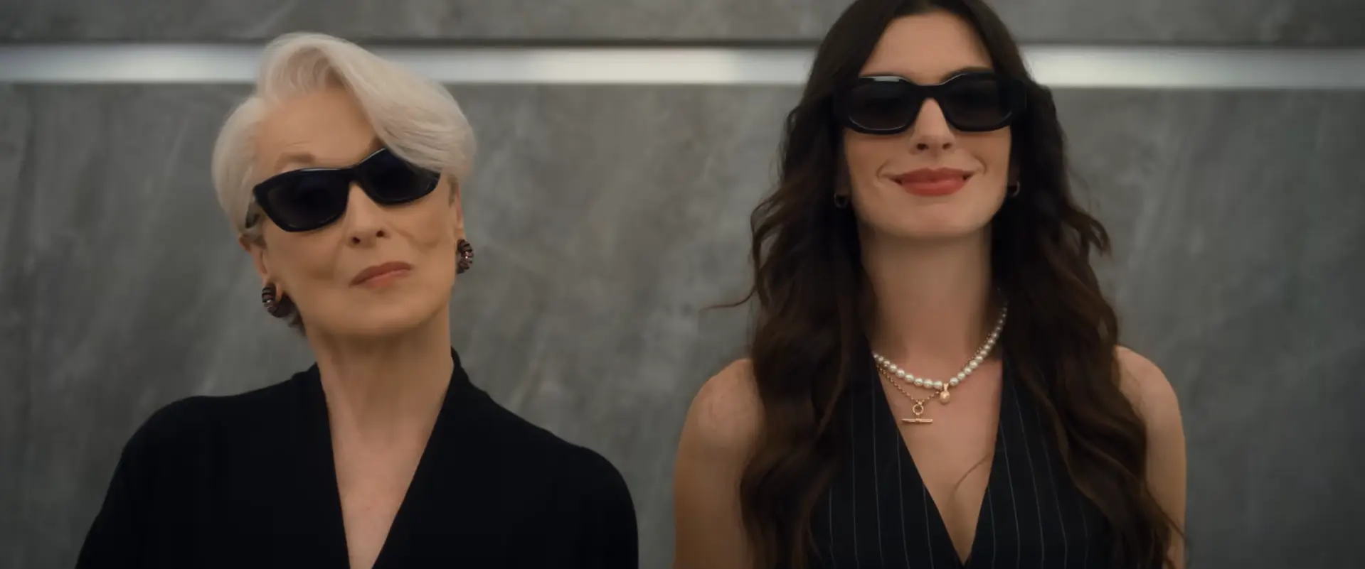 エレベーターで再会するミランダとアンディ